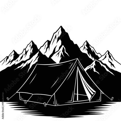 camping tent in front of mountain range silhouette