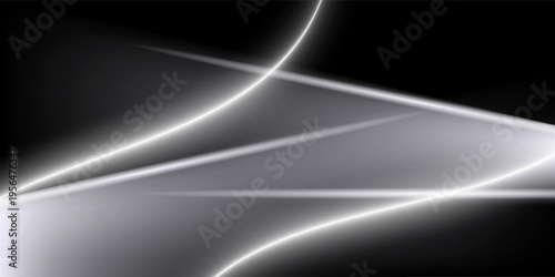 Abstract light streaks on a dark backdrop creating a dynamic, energetic mood.