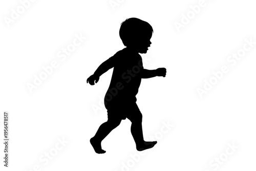 Silhouette of a Toddler in Motion: A captivating silhouette captures the joyous spirit of a young child in mid-stride, showcasing the energy of youth.