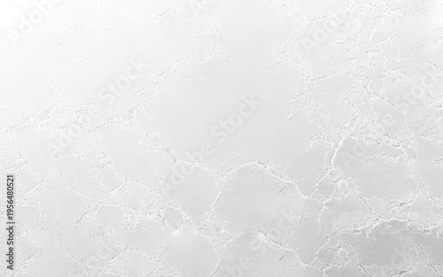 Gray white cement rough plaster wall texture background with subtle concrete surface details, neutral minimalist wallpaper pattern in horizontal 