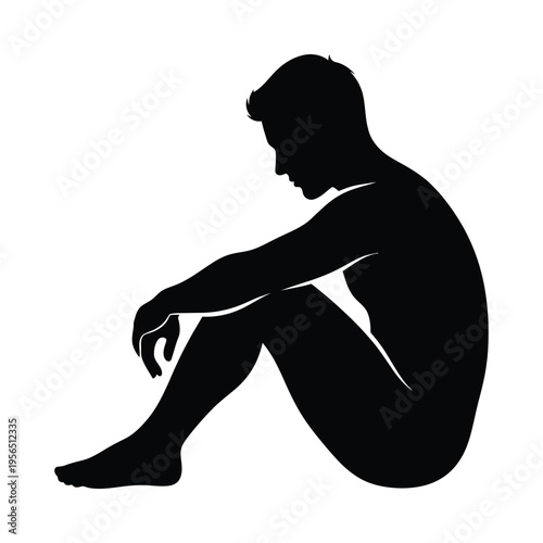 Silhouette of a lone man sitting in deep thought, conveying a mood of contemplation and solitude