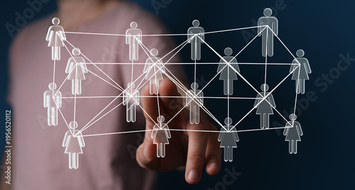 Hand pointing at network of...