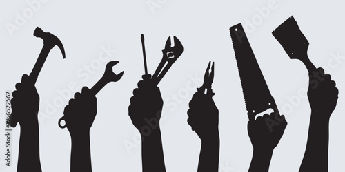 Silhouettes of hands holding various construction and repair tools, symbolizing labor and craftsmanship.