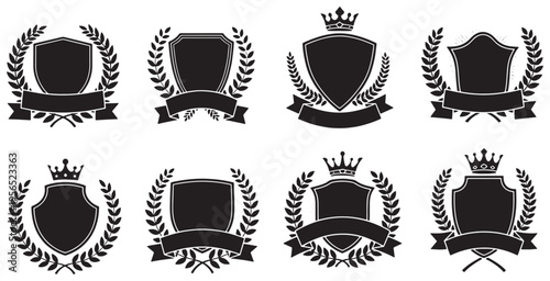 Set of black and white shield emblems with crowns, banners, and laurel wreaths, perfect for heraldry and vintage designs.