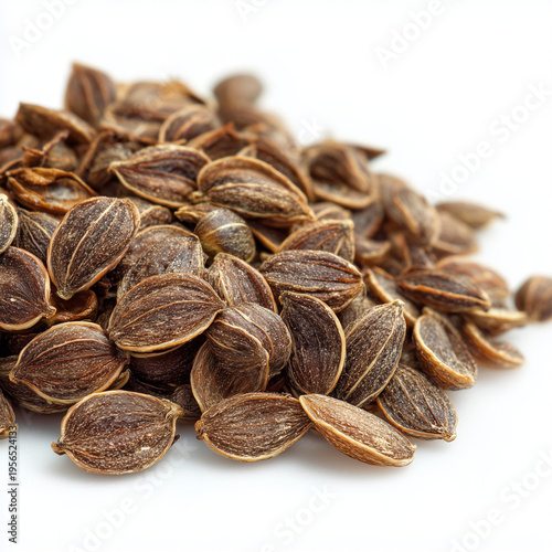 dried dill seeds on white background