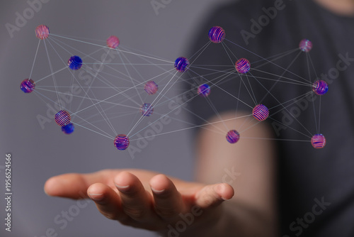 Person holding a digital ne...