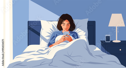 Young woman relaxing in her bedroom at night while lying in bed and scrolling through her smartphone before sleeping.