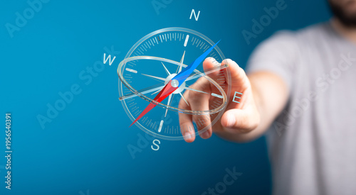 A person pointing to a virt...