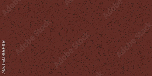 A textured reddish brown background with a grainy speckled appearance