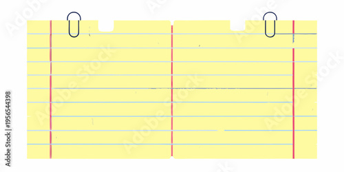 Yellow lined notepad paper with two silver binder clips attached