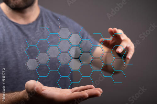 A man's hands cradling a di...