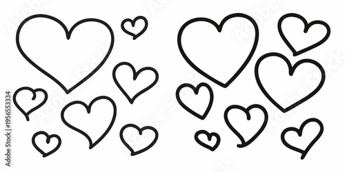 Collection of hand drawn black hearts scattered across a white background