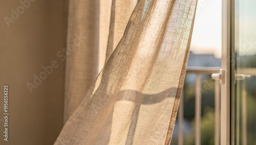 Sunlit linen curtains blowing in summer breeze by balcony for relaxation and tranquility