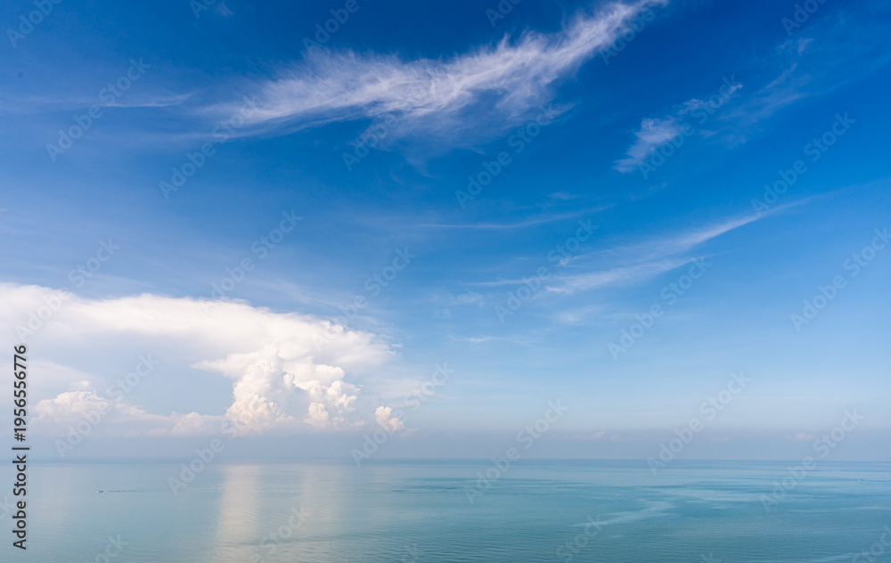 Fototapeta premium View of blue sky and ocean with white cloud