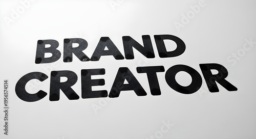 Bold black text declaring the essential title brand creator printed clearly on a clean white background surface