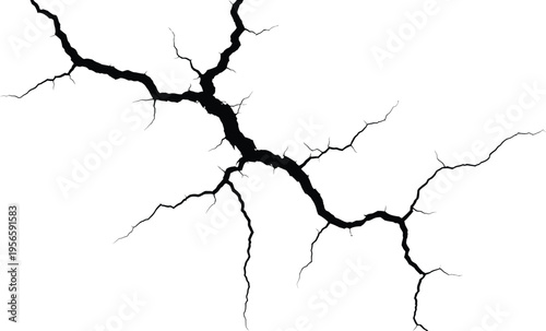 Black cracks spreading across surface