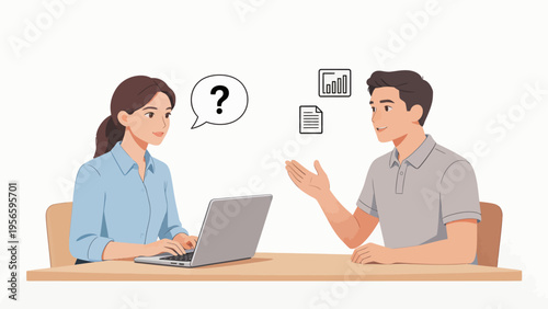 Two people discussing at a desk