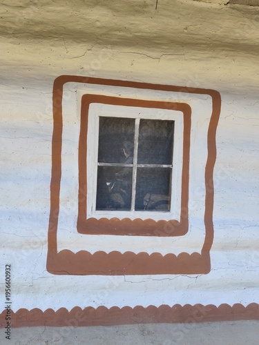 An antique window on the wall