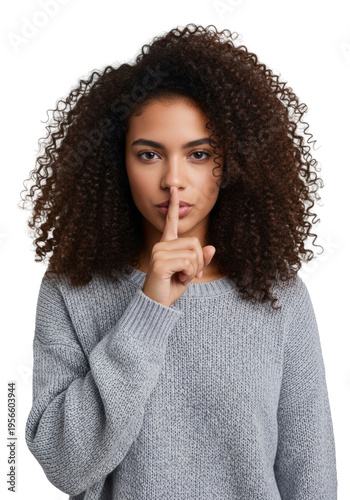 Beautiful hispanic teenage girl (17) with voluminous dark curly hair, wearing a pale sweater, making the 'shush' gesture against a high-key studio background, ultra-photorealistic concept of secrecy