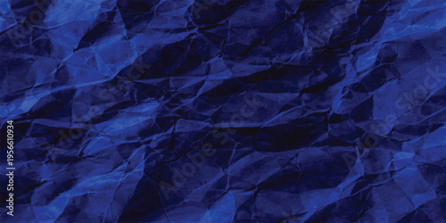 An abstract representation of deep blue textured layers creating a sense of mysterious mountain peaks