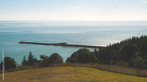 view from above oamaru town harbour sea side ocean calm blue clear scenery landscape beautiful tranquility 