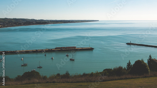 view from above oamaru town harbour sea side ocean calm blue clear scenery landscape beautiful tranquility 