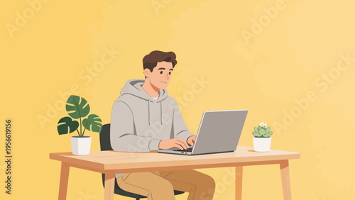 Person working on laptop at desk