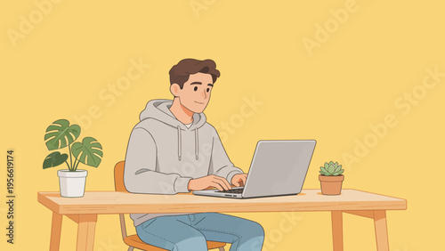 Person working on laptop at desk