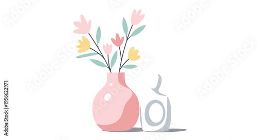 Two decorative vases, one pink with flowers and one white with a cutout, sit on a light surface against a white background.