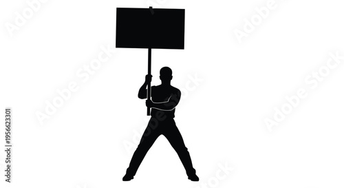 Silhouette of a strong person holding a large rectangular blank sign aloft with both hands demonstrates protest or announcement readiness.