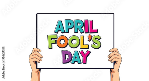 Hands holding a colorful sign displaying april fool s day