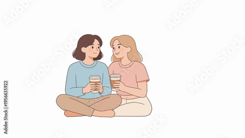 Two women sitting with coffee cups