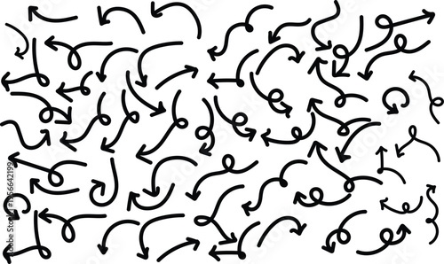 A chaotic arrangement of black arrows on a pointing in various directions