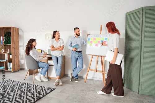 Group of young people discu...