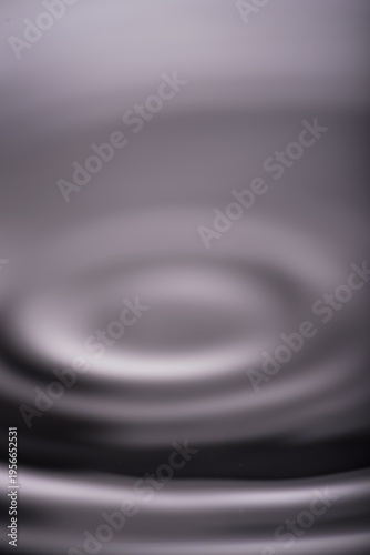 267.Close-up Of Dark Water Ripple With Soft Wave Patterns