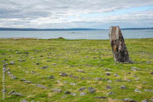 Transteinen Sacred Standing Stone with Thirteen Stone Circles at Ceavccageađge Mortensnes Sami Heritage Site, Varanger, Finnmark, Norway