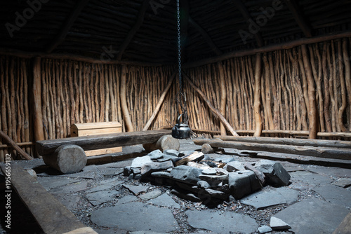 Interior of Traditional Sami Gamme Turf Hut with Central Hearth Arran and Kettle on Chain, Ceavccageađge Mortensnes, Finnmark, Norway
