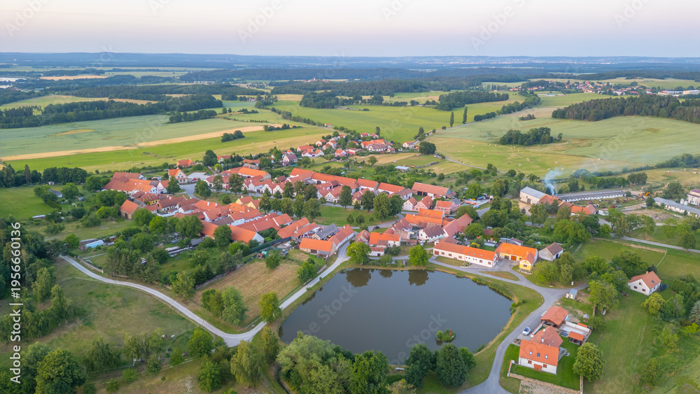 Obraz premium Sunset panorama view of traditional south Bohemian village Holas