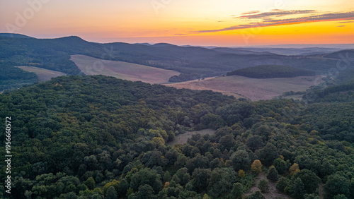 Sunset view of forests around Holloko castle in Hungary