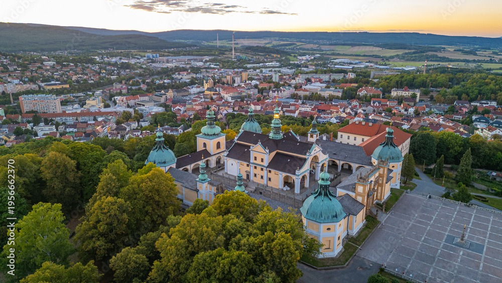 Fototapeta premium Sunset panorama view of Svata Hora pilgrimage site near Pribram,
