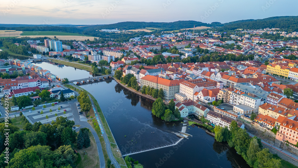 Fototapeta premium Sunset panorama of the old town of Pisek, Czech republic