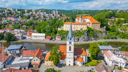 Foto Summer day at Ledec nad Sazavou palace and saint peter and paul