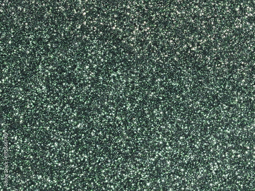 Macro shot of focus stacked dark green metallic car paint texture