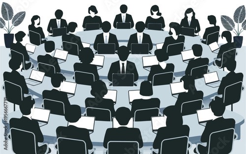 Auditorium filled with people wearing black chairs in a theater setting