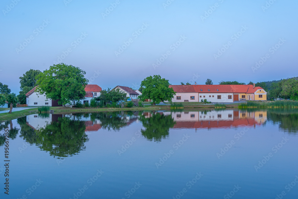Fototapeta premium Sunset view of traditional south Bohemian village Holasovice, Cz