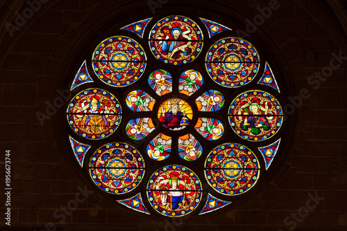 Stunning Gothic stained glass rose window located inside the Church of St. Peter in Dreux, France