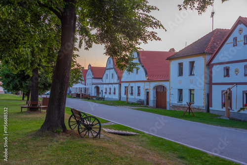 Fotografie Sunset view of traditional south Bohemian village Holasovice, Cz