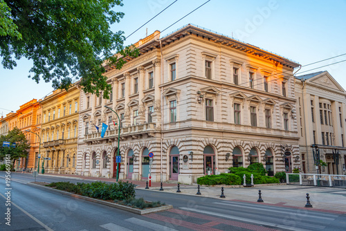 Bild auf Leinwand Sunrise view of historical houses in Szeged, Hungary