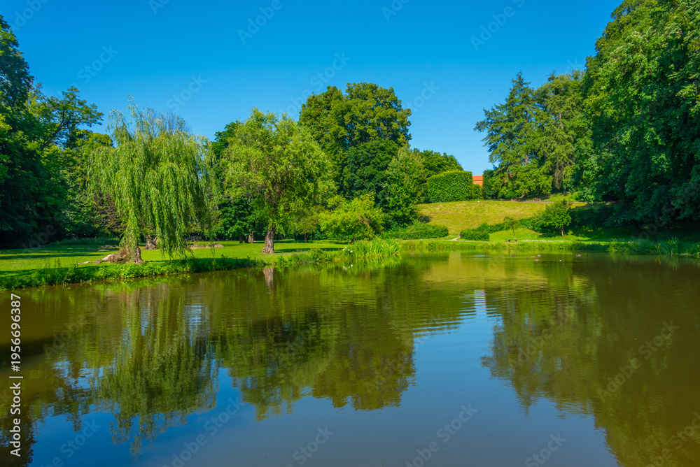 Fototapeta premium Sunny day at a park at Vizovice palace, Czech republic