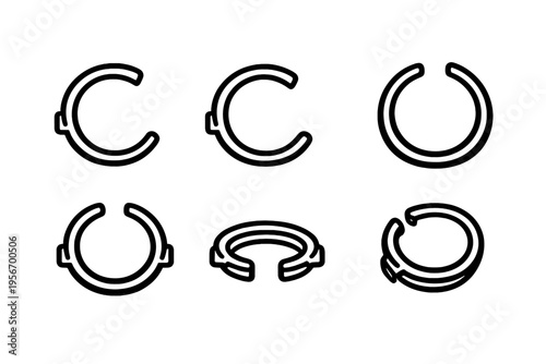 Collection of black line circlip retaining rings and external snap clips used in mechanical assembly and industrial engineering